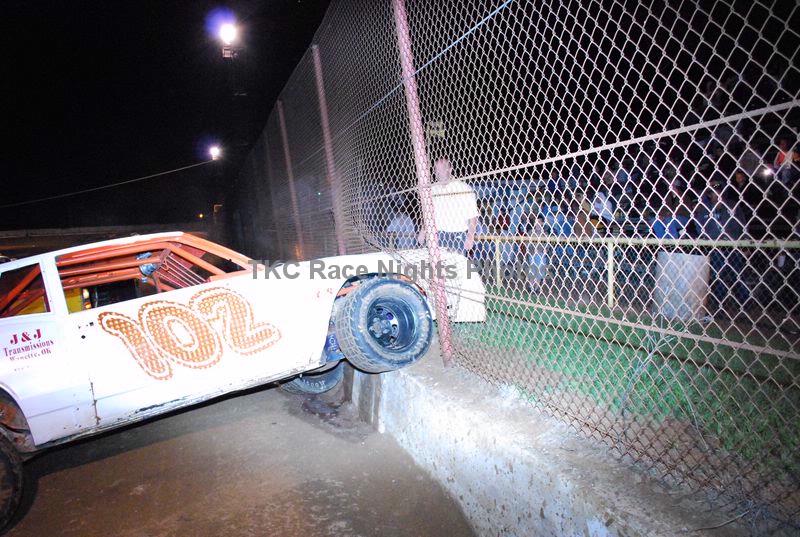 Pure Stock (102) Pat Cope tries to leave the track thought the fence. 